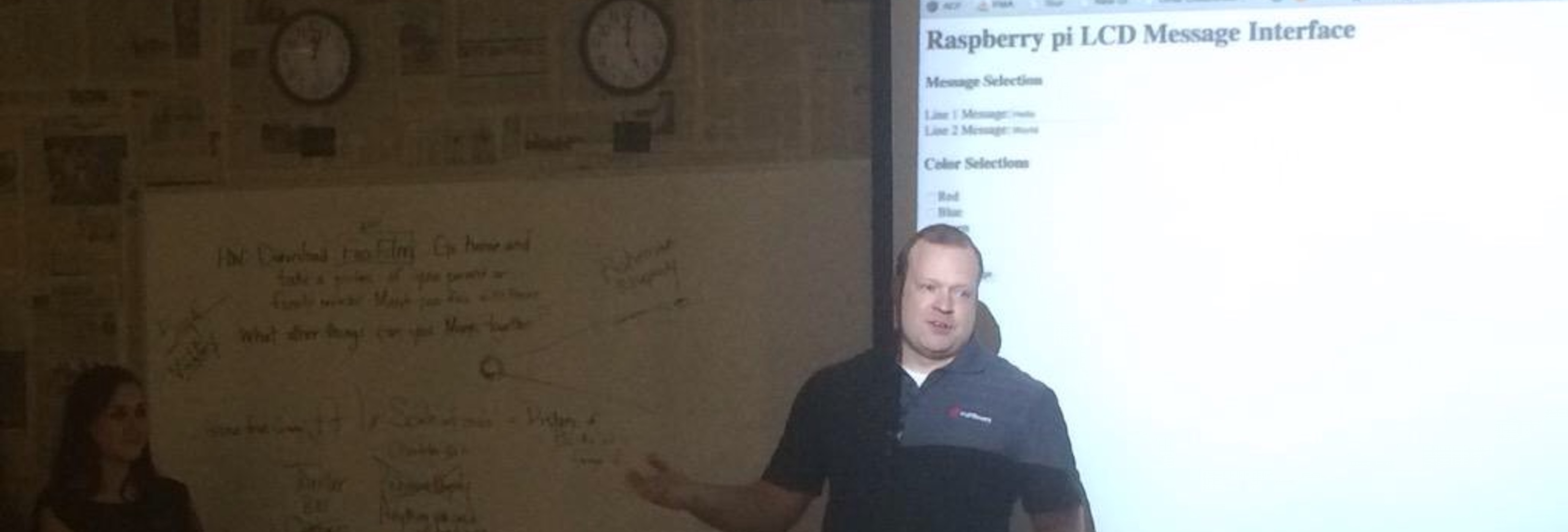 Chris Kreider presenting simple programs using the Raspberry Pi during STEM week at a local academy